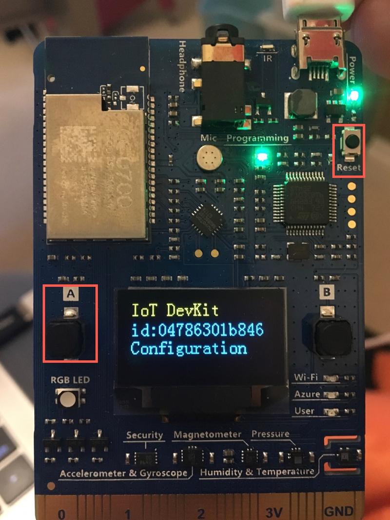 The A and reset buttons on the IoT device