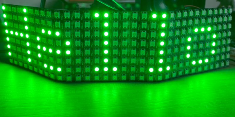 An LED panel showing Hello in green