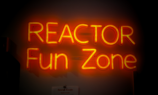 A red neon sign saying Reactor Fun Zone